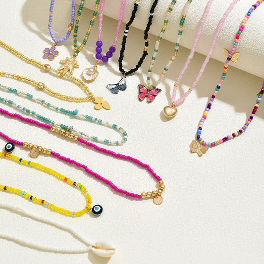 Set de pulseras trenzadas multicapa para mujer, estilo OL elegante y minimalista, con detalles de concha, nudo de lazo, hoja y formas geométricas