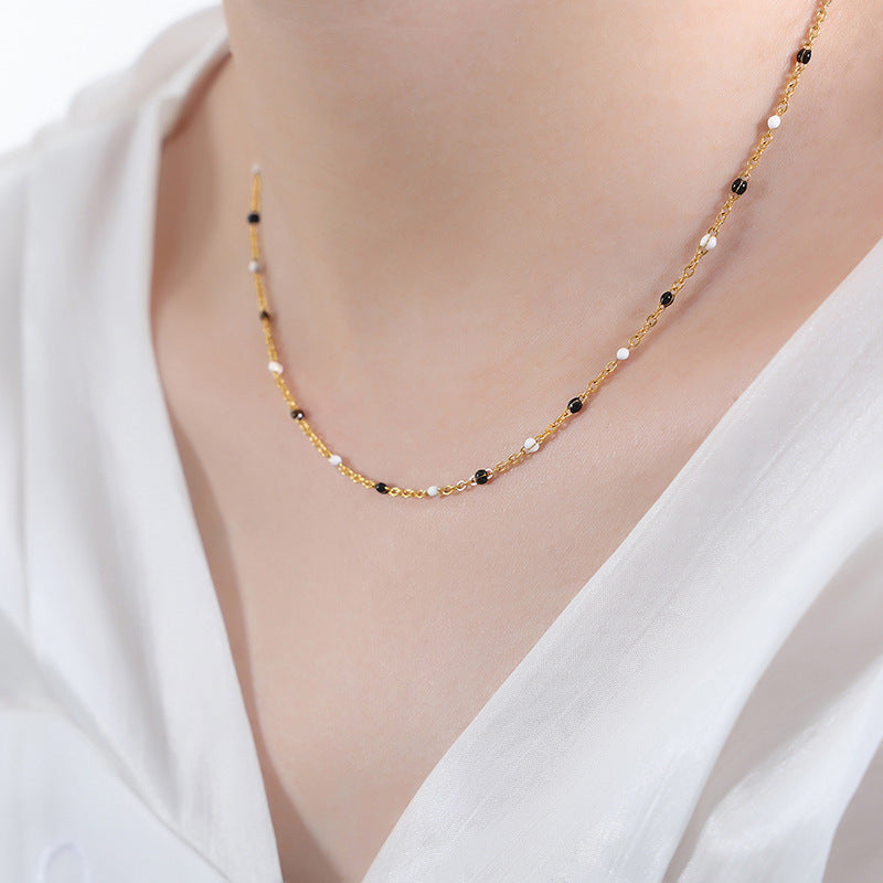 Conjunto minimalista de collar y pulsera de cadena con eslabones O de acero de titanio y detalles de esmalte para mujer
