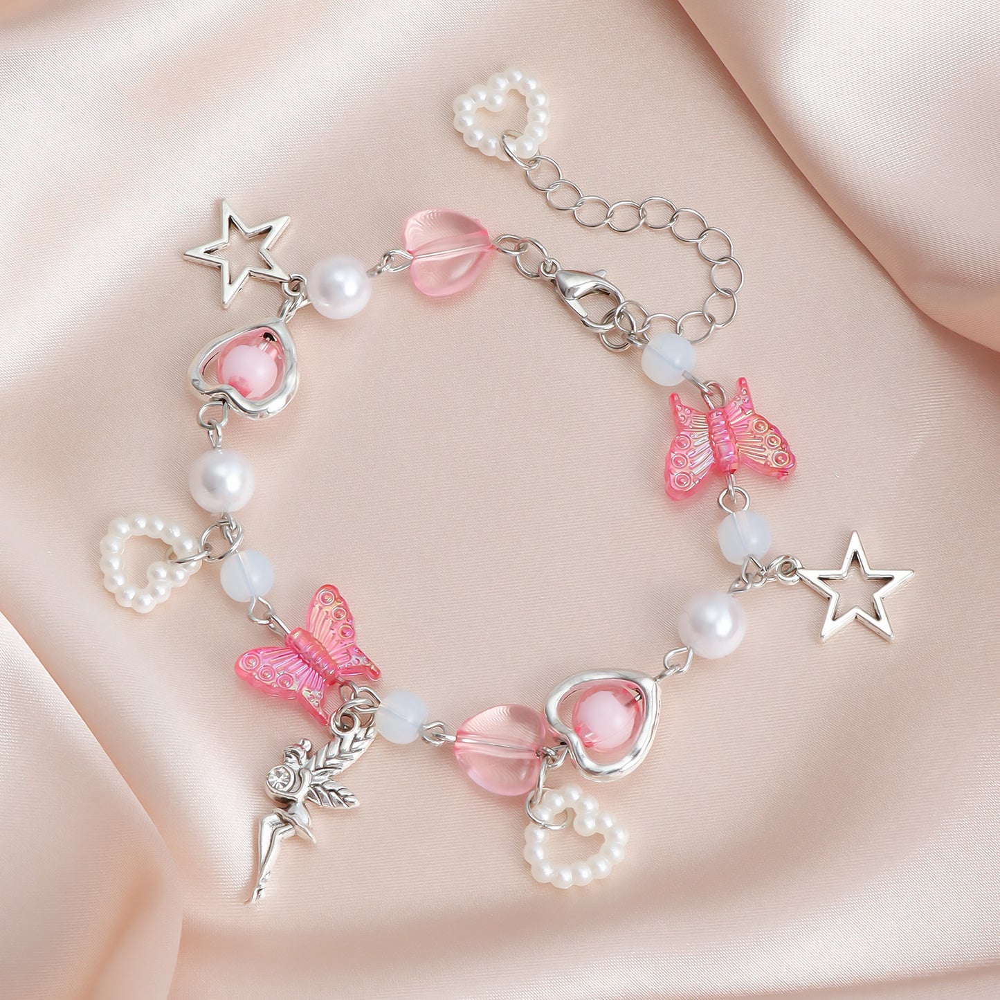 Bracciale da donna minimalista con perline a forma di cuore e stella, impreziosito da cristalli e catena in metallo placcato