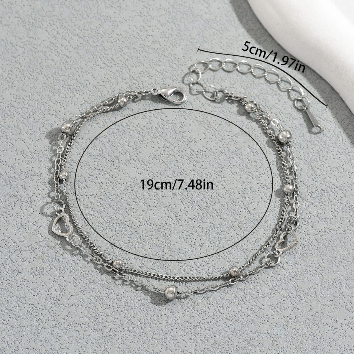 Bracciale da donna placcato rame con cuore geometrico minimalista e forma a diamante, con elegante design a doppio strato