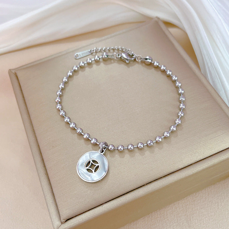 Pulsera redonda con diseño de conchas y cuentas estilo vintage para mujer, hecha de acero de titanio con acabado chapado