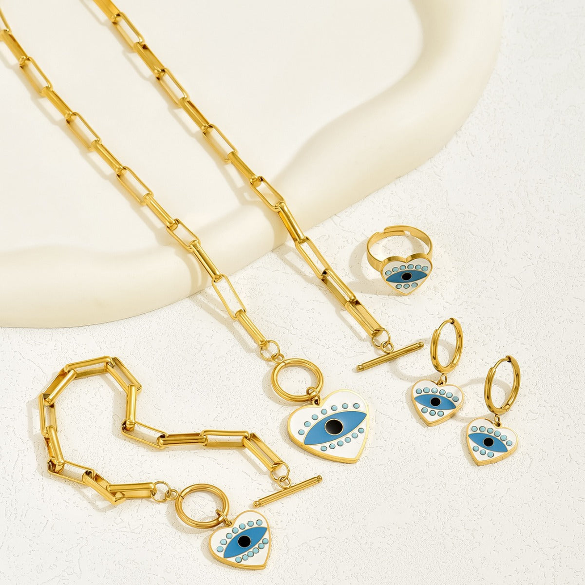 Conjunto de collar, aretes, pulsera y anillo esmaltado de ojo turco con diseño de corazón de moda para mujer