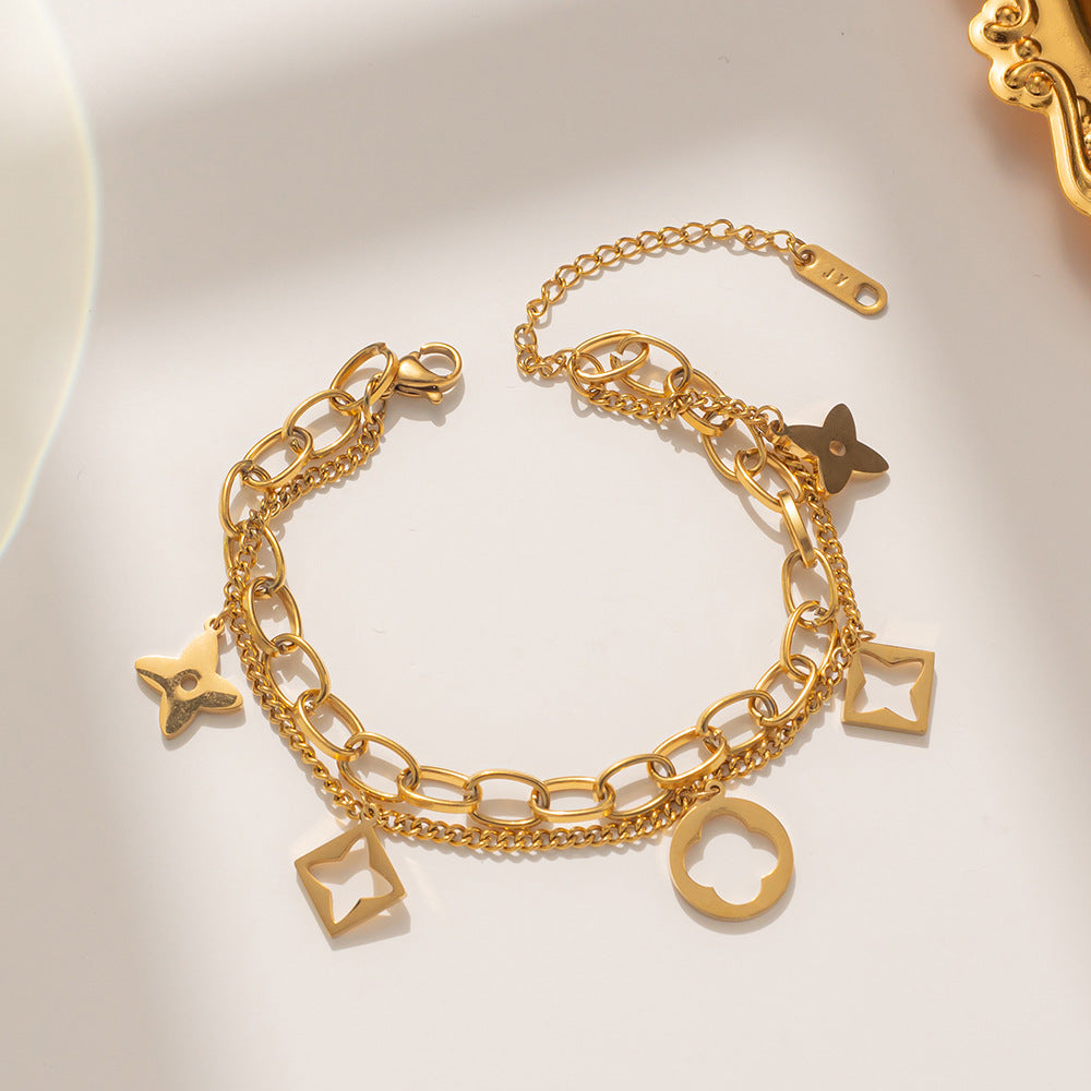 Bracciale da donna in acciaio inossidabile a forma di trifoglio, placcato in oro rosa 18 carati e con design traforato