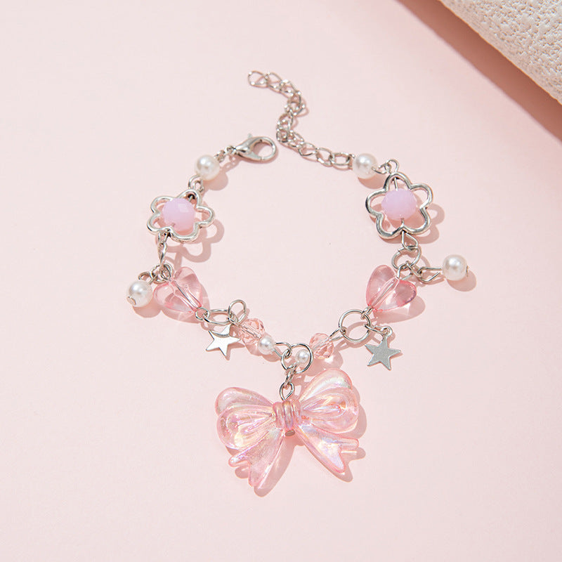 Braccialetto con fiocco e perline di cristallo fatto a mano per ragazze in stile principessa con materiale in resina e design a forma di stella