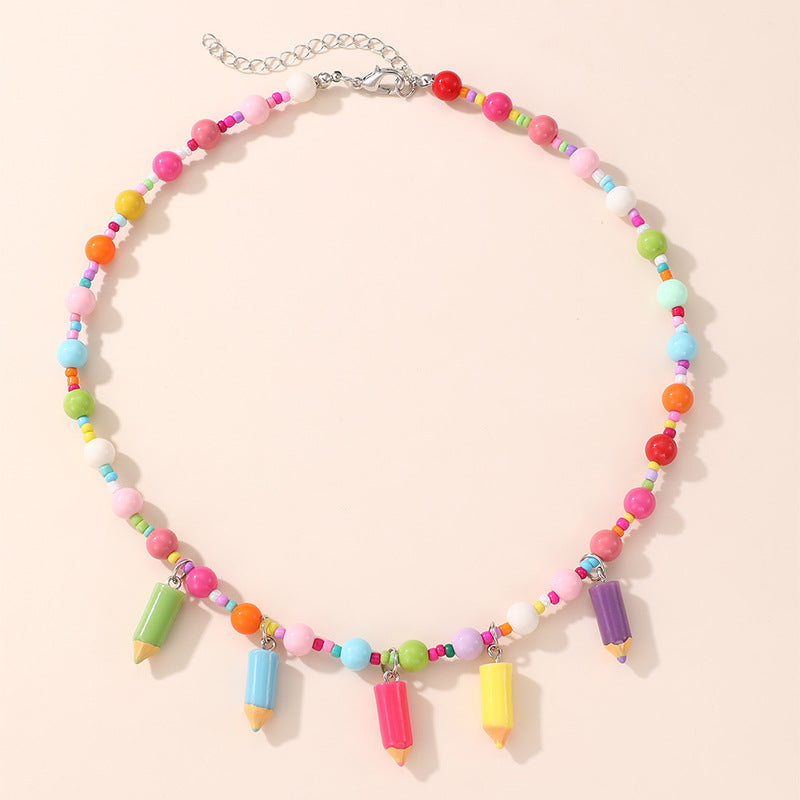 Collana con ciondolo a fiocco dolce pastello per ragazze con ciondolo in resina su catena a O, gioielli in stile cartone animato