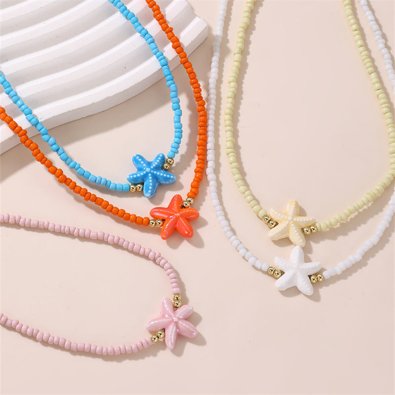 Collana Minimalista con Ciondolo a Fiocco a Farfalla per Bambini con Perline Rosa in Vetro su Catena di Perline Rotonde