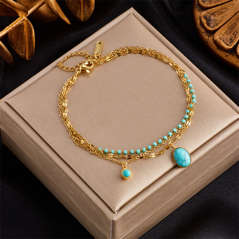 Bracciale in Acciaio Inox da Donna con Finitura Placcata e Ciondolo a Farfalla Turchese d'Ispirazione Vintage