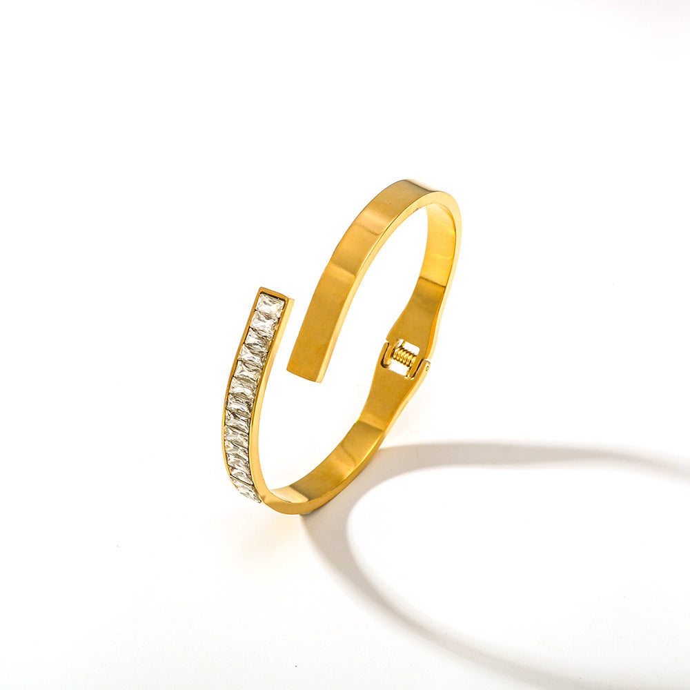 Bracciale minimalista in acciaio inossidabile con intarsio in zirconi quadrati e chiusura a molla da donna