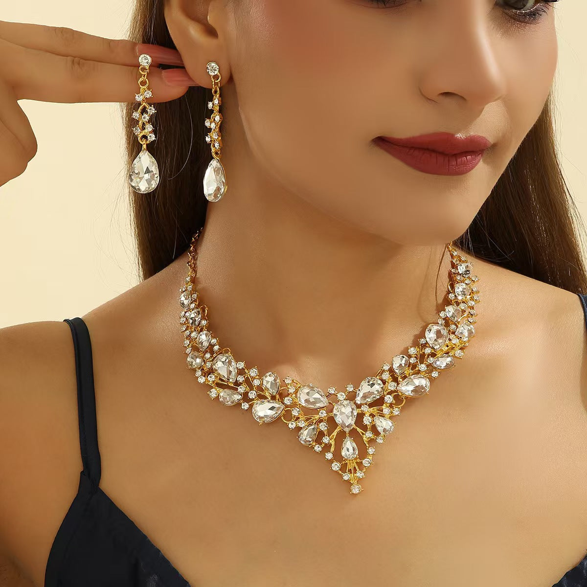 Elegant Waterdrop Floral Pattern Rhinestone Pendant Necklace Earrings Bracelet Set for Women with Alloy Base and Plated Finish