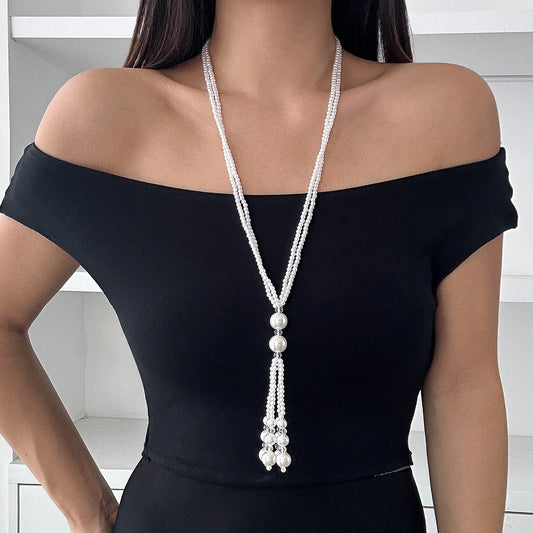 Collar con colgante geométrico minimalista con borlas de perlas de imitación y cadena de cuentas de cristal multicapa para mujer