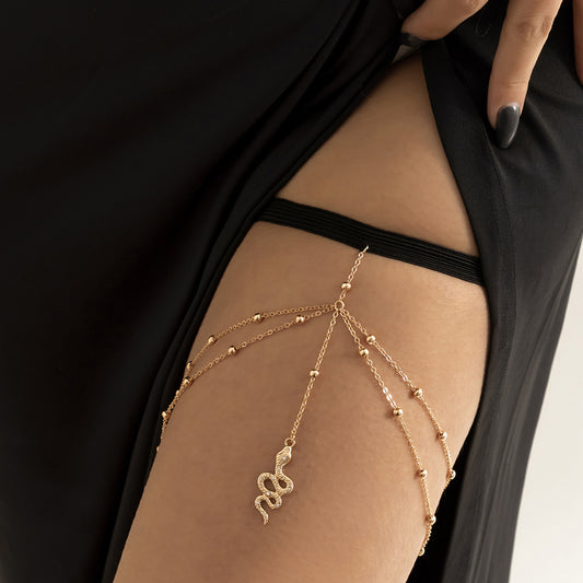 Minimalist Snake-Shaped Metal Anklet with Elastic Double Beaded Chain and Tassel Detail for Women