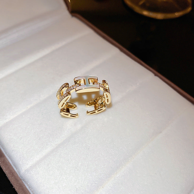 Anello da donna aperto a rombo a forma di fiore di iris in rame con intarsio di zirconi, ispirato al vintage