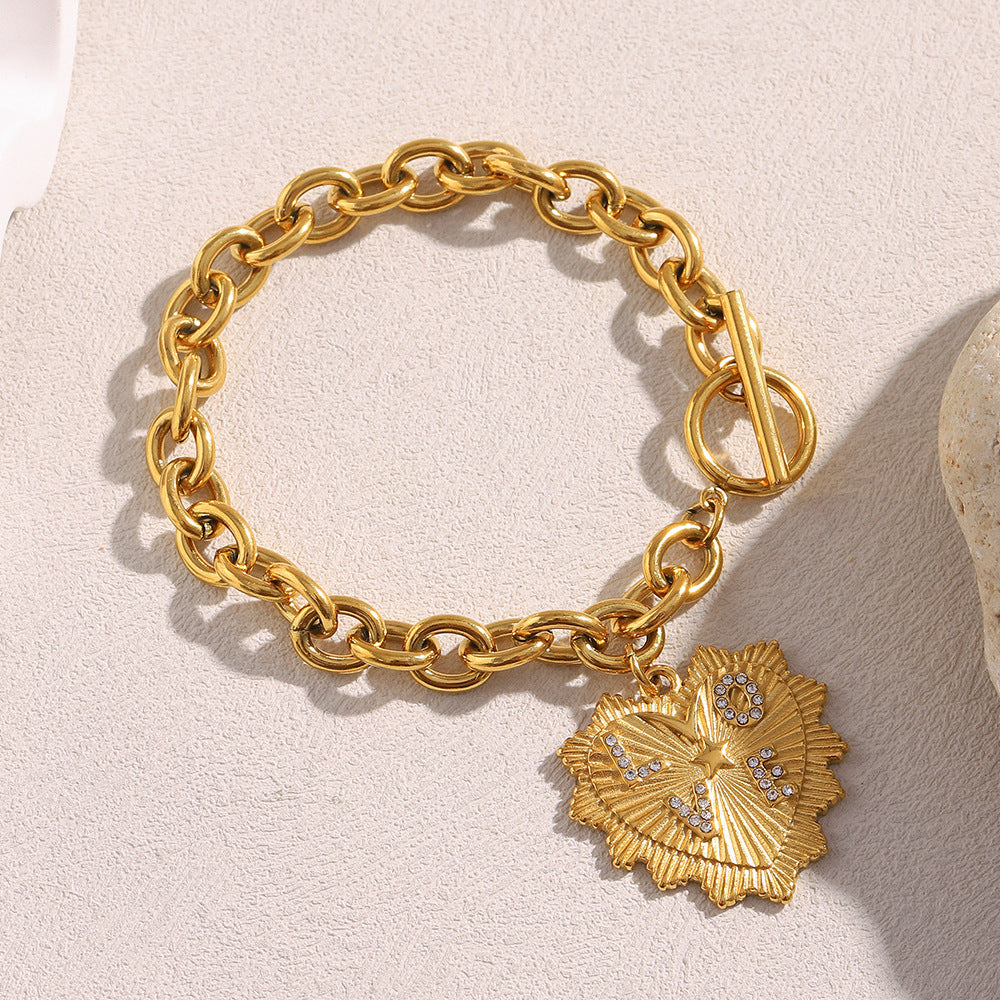 Set di collana e bracciale pendente a cuore in stile vintage in acciaio inossidabile con placcatura in oro 18 carati su catena O-ring