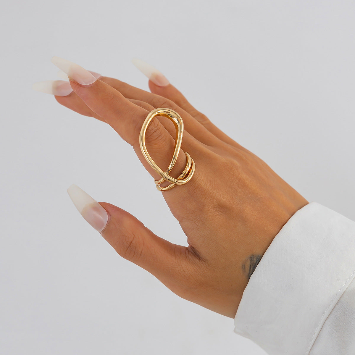 Bracciale irregolare in lega lucida a forma di foglia con bracciale aperto a strisce testurizzate