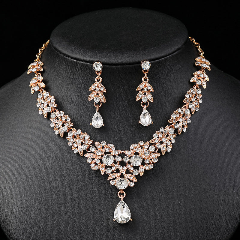 Set di collana e orecchini da sposa con motivo floreale, in lega con ciondolo decorato con strass, catena a serpente, design minimalista a tulipano, margherita e petali di foglie