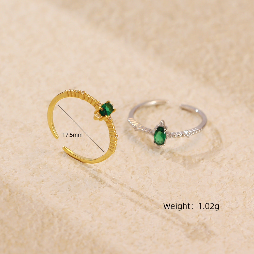 Anello di lusso elegante geometrico placcato in argento sterling 925 con zirconi cubici color smeraldo, rotondo, ovale, design aperto da donna