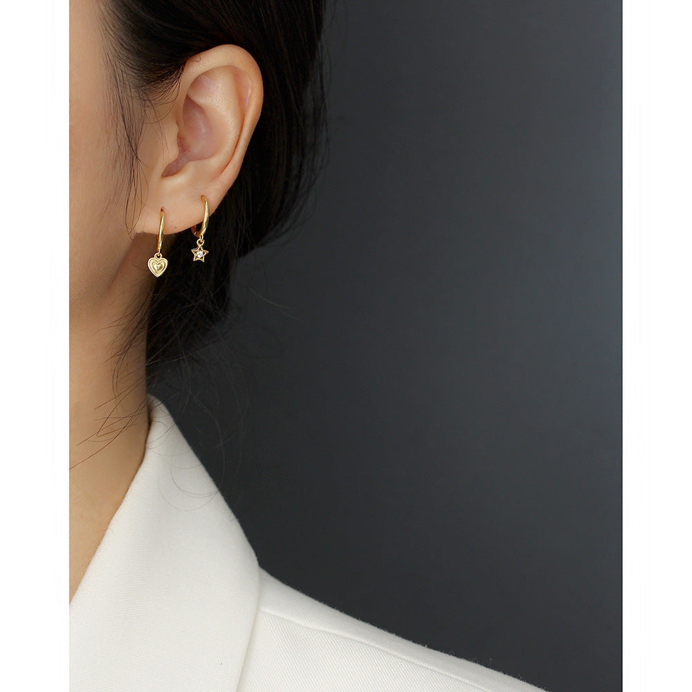 Orecchini a perno da donna a forma di stella minimalisti in argento sterling placcato