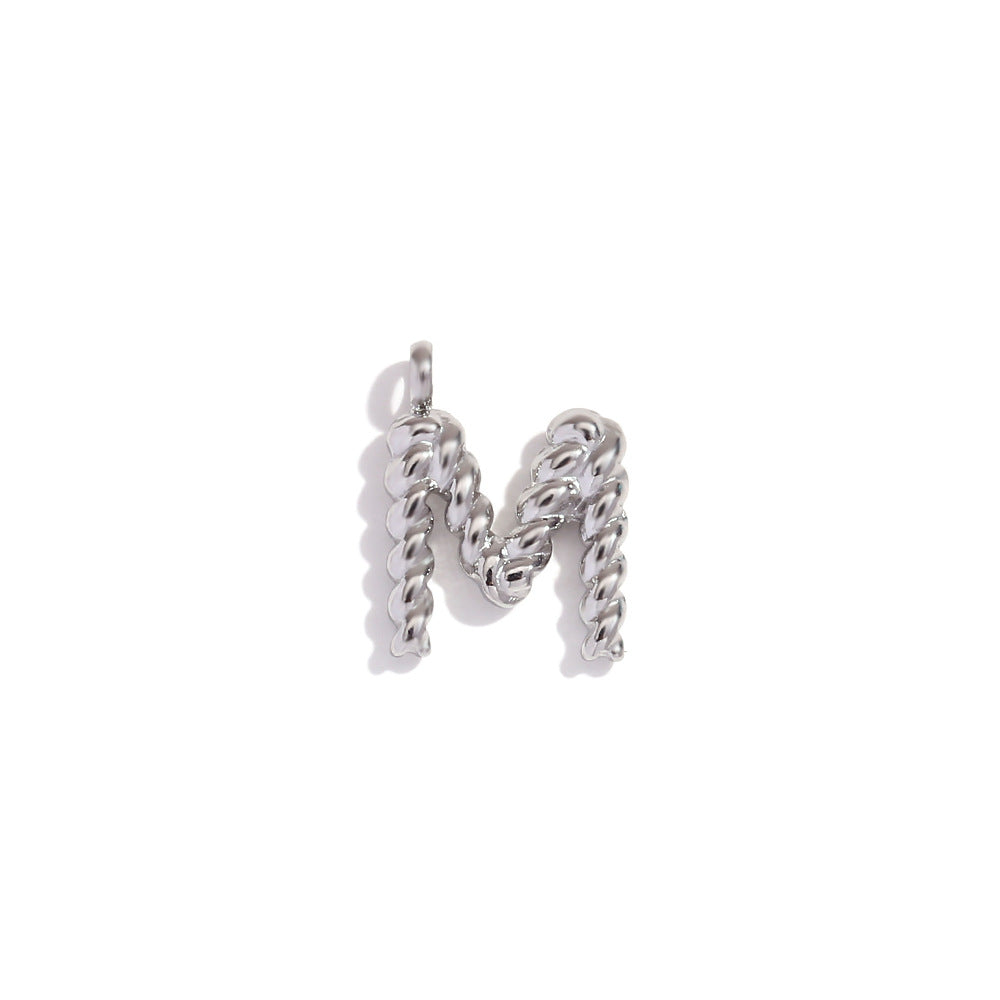 Colgante minimalista de acero inoxidable chapado en oro de 18 quilates con mini letra retorcida para mujer