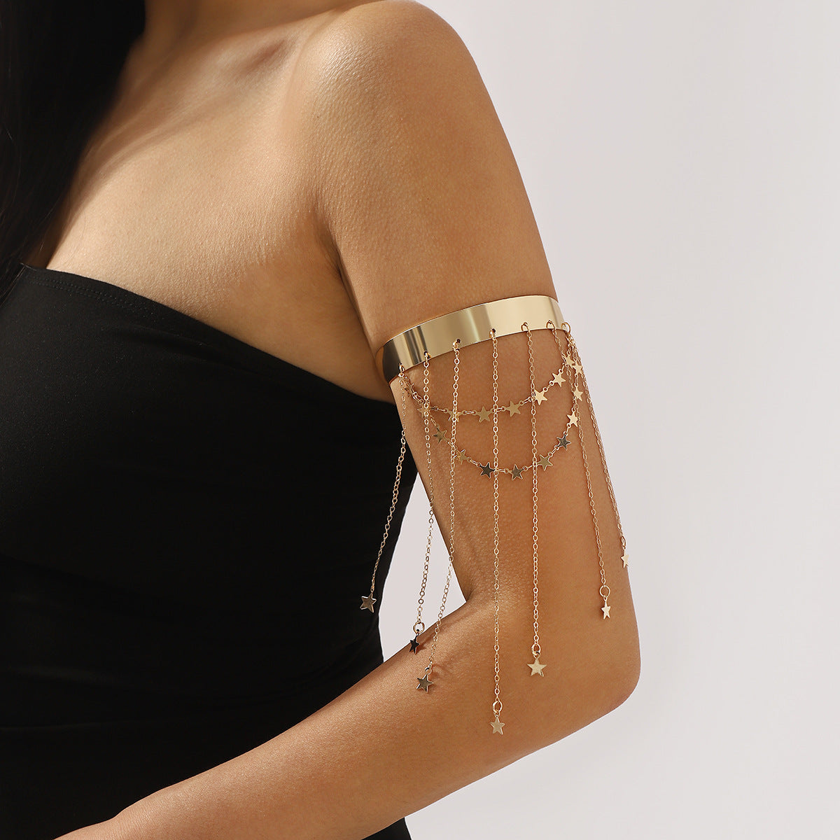 Pulsera ajustable vintage en forma de estrella con detalle de borla en hierro galvanizado
