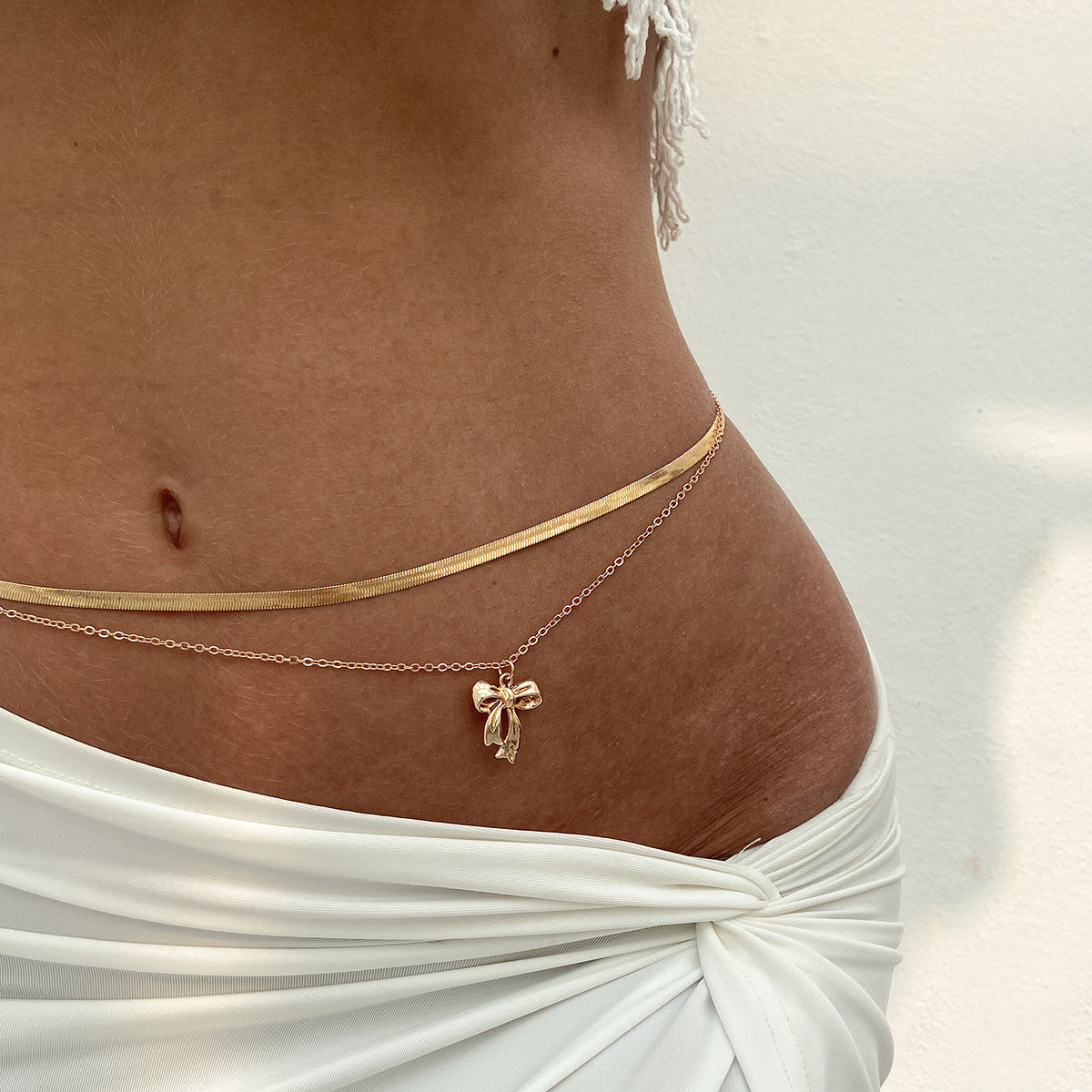Catena in vita da donna a doppio strato con pendente a croce minimalista e nappe effetto perla