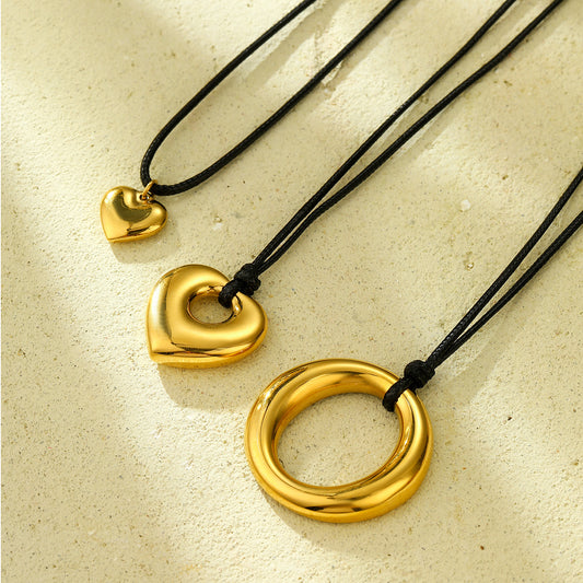 Minimalist Hollow Heart Pendant Necklace for Women in Stainless Steel with Plated Finish on Adjustable Black Wax Cord