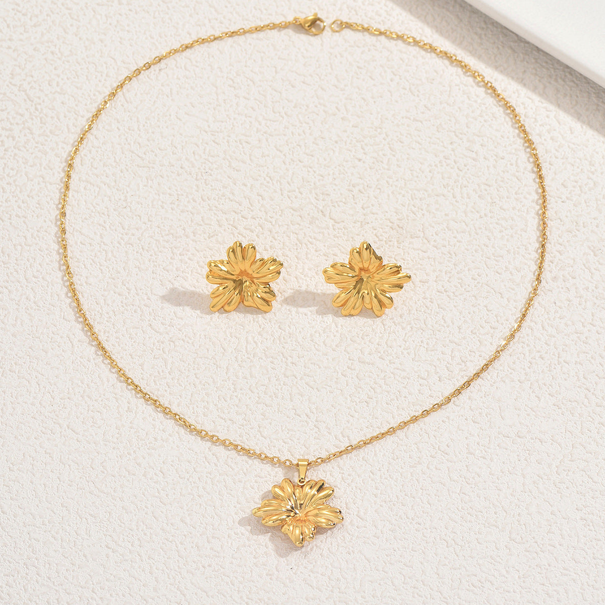 Set di collana e orecchini a pendente a cuore geometrico in lega con finitura placcata per donna
