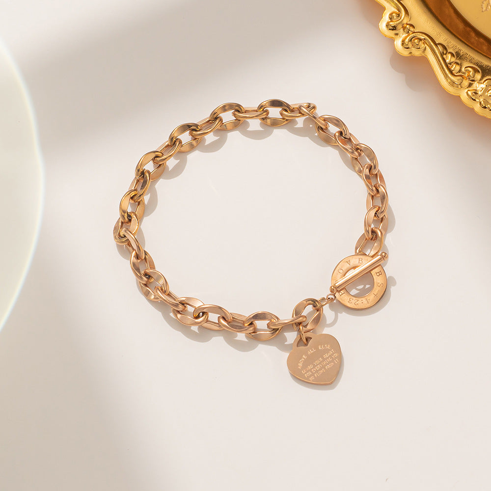 Bracciale a catena a O in acciaio al titanio alla moda da donna con forma a cuore e placcatura in rodio, versatile per l'ufficio