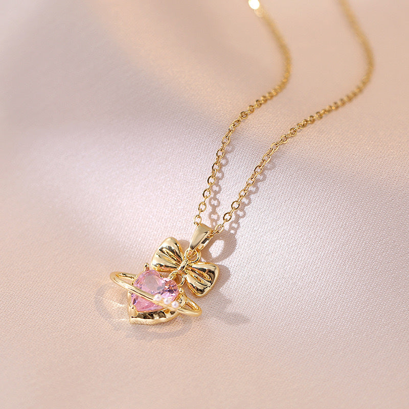 Sweet Minimalist Bow and Heart Shaped Titanium Steel Pendant Necklace with Rhinestone Inlay on O-Chain for Women
