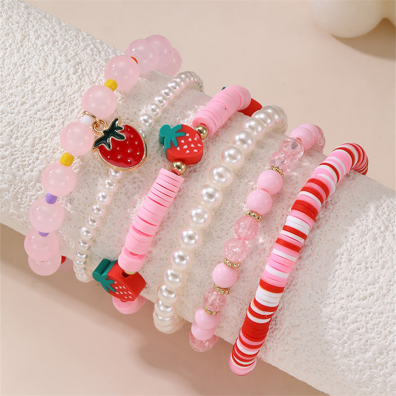 Bracciale per bambine con ciondolo a fiocco, perline acriliche e design a forma di stella