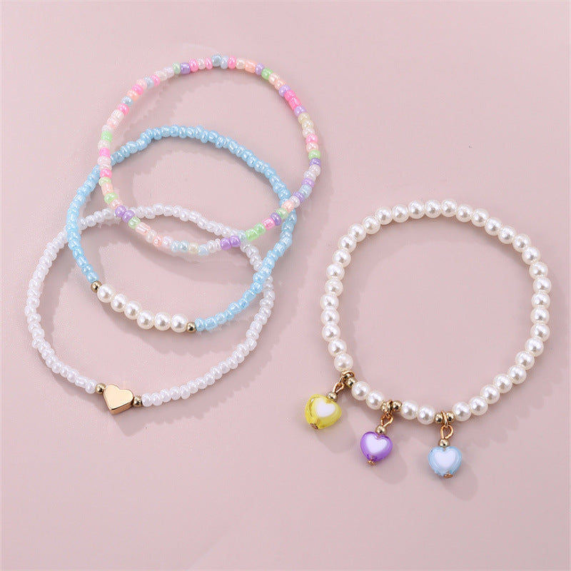 Tobillera Minimalista de Cuentas en Forma de Corazón con Cuentas Miyu Coloridas y Detalles de Perlas para Niñas
