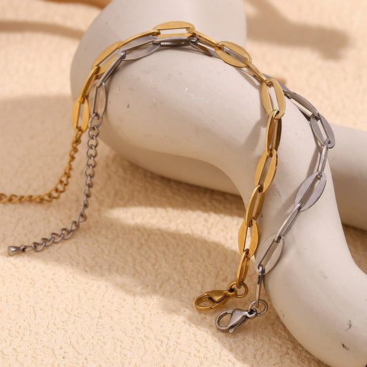 Pulsera de Acero Inoxidable con Baño de Oro de 14K con Forma de Labios Geométrica Minimalista para Mujer