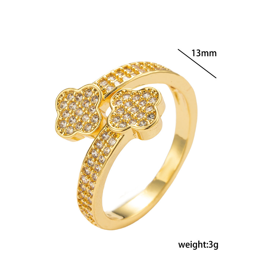 Bracciale minimalista a quadrifoglio in rame placcato oro 18 carati con intarsio completo di strass da donna
