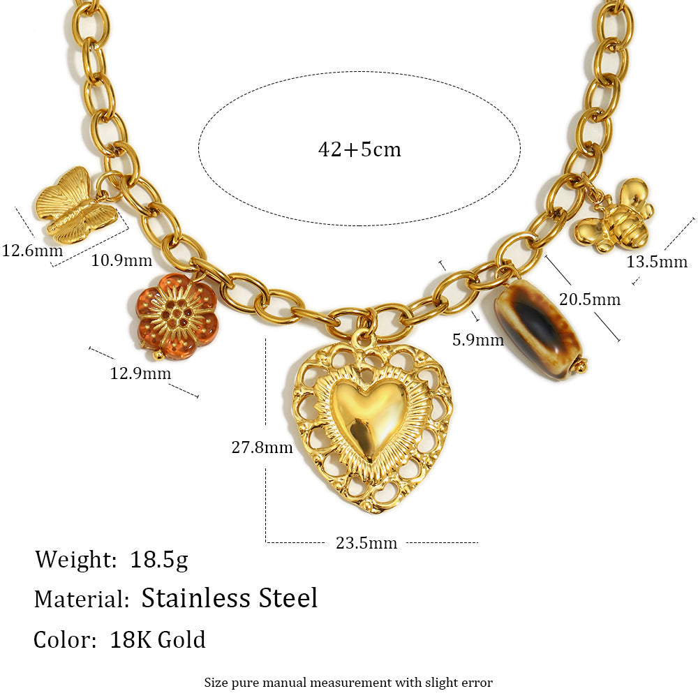 Luxury Vintage Hollow Heart Pendant Necklace in Stainless Steel with 18K Gold Plating on O-Chain