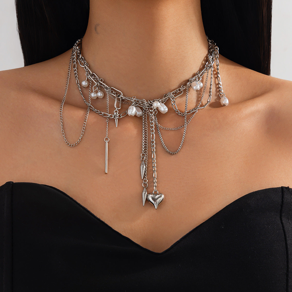 Sweet and Edgy Heart-Shaped Rivet Pendant Necklace for Women with Alloy and Stainless Steel, Electroplated Finish, Tassel Detail, Box Chain