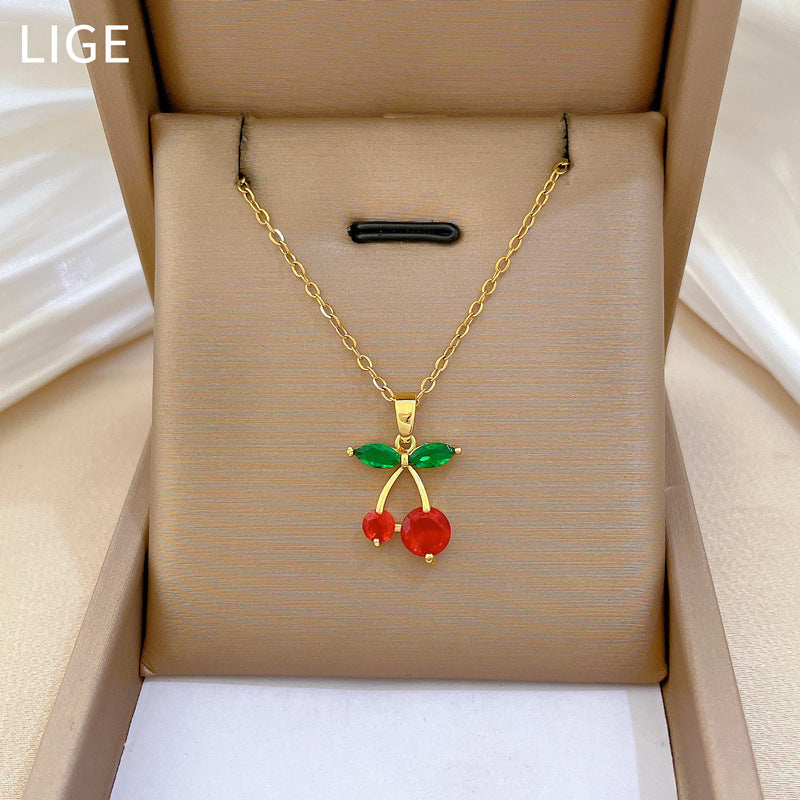 Collar con colgante de cereza de dibujos animados para mujer, de acero inoxidable con incrustaciones de diamantes de imitación y delicada cadena de clavícula