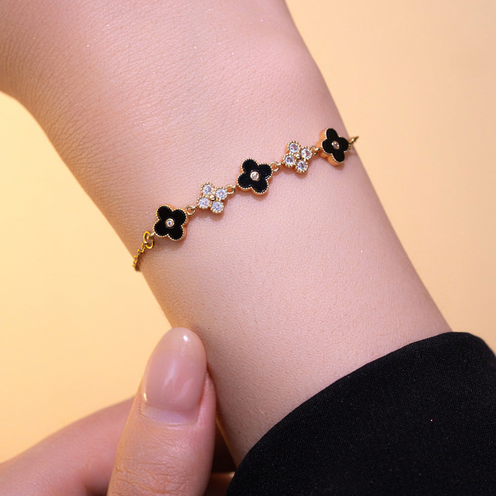 Bracciale da donna in acciaio al titanio placcato oro con zirconi intarsiati, motivo floreale e geometrico, stile pendolare, moda lusso leggero