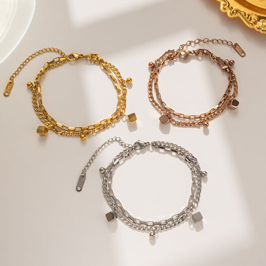 Pulsera de Moda de Acero de Titanio Geométrico de Doble Capa para Mujer con Chapado en Oro y Cuentas de la Suerte