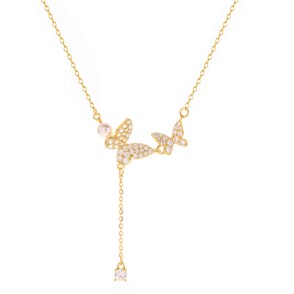 Elegante collana a farfalla in argento sterling 925 con zirconi cubici e nappe di perle a catena forzata da donna