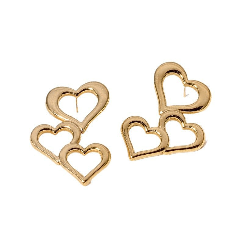 Orecchini a perno minimalisti da donna in acciaio inossidabile a forma di cuore cavo con finitura placcata
