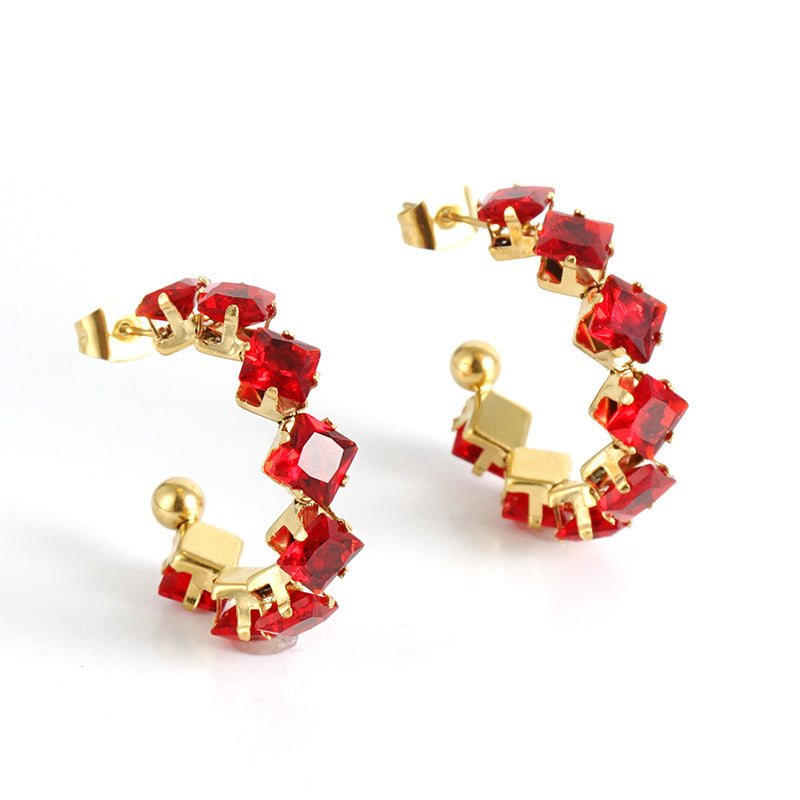 Orecchini a perno da donna alla moda geometrici in acciaio al titanio placcato oro 18K con zirconi