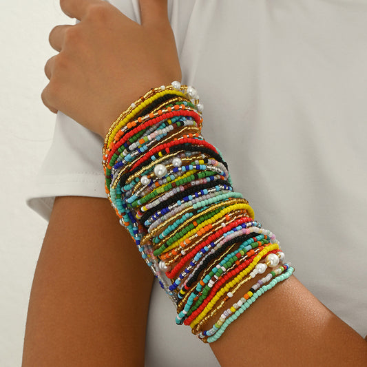 Conjunto de pulseras geométricas y de moda para mujer, estilo oficina, con diseño de cuentas tejidas multicapa en colores arcoíris