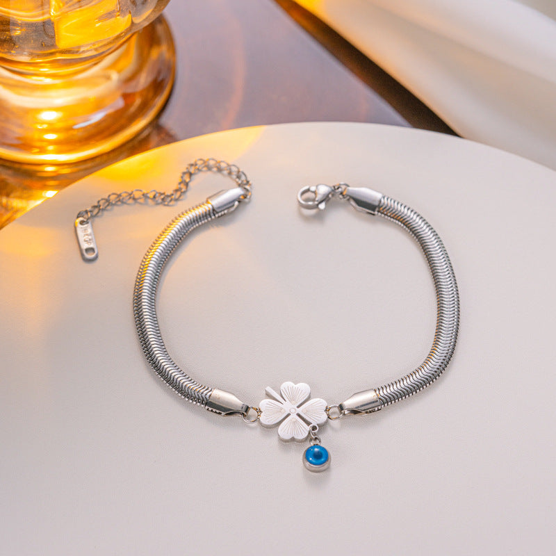 Bracciale a catena a serpente in acciaio al titanio placcato oro 18 carati con cuore e occhio blu per donna, moda OL