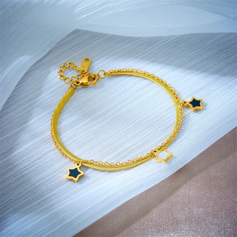 Bracciale con ciondolo a stella bicolore minimalista in acciaio al titanio per donna
