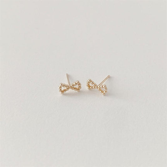 Orecchini a perno minimalistici a fiocco in argento sterling 925 con finitura placcata da donna