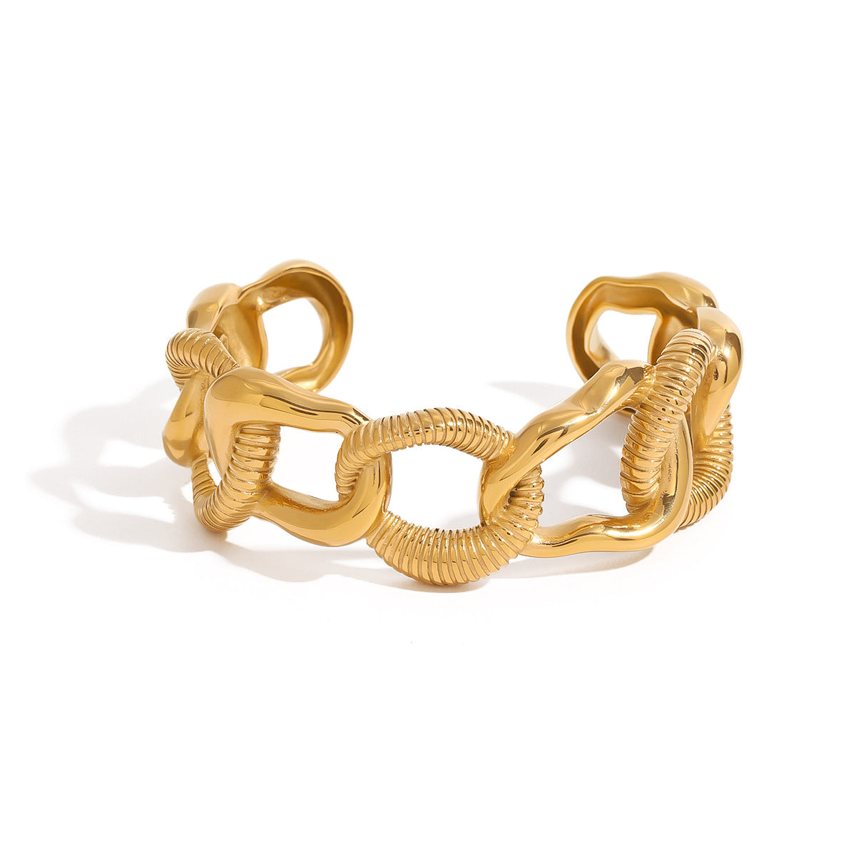 Brazalete de acero inoxidable chapado en oro con diseño geométrico minimalista para mujer