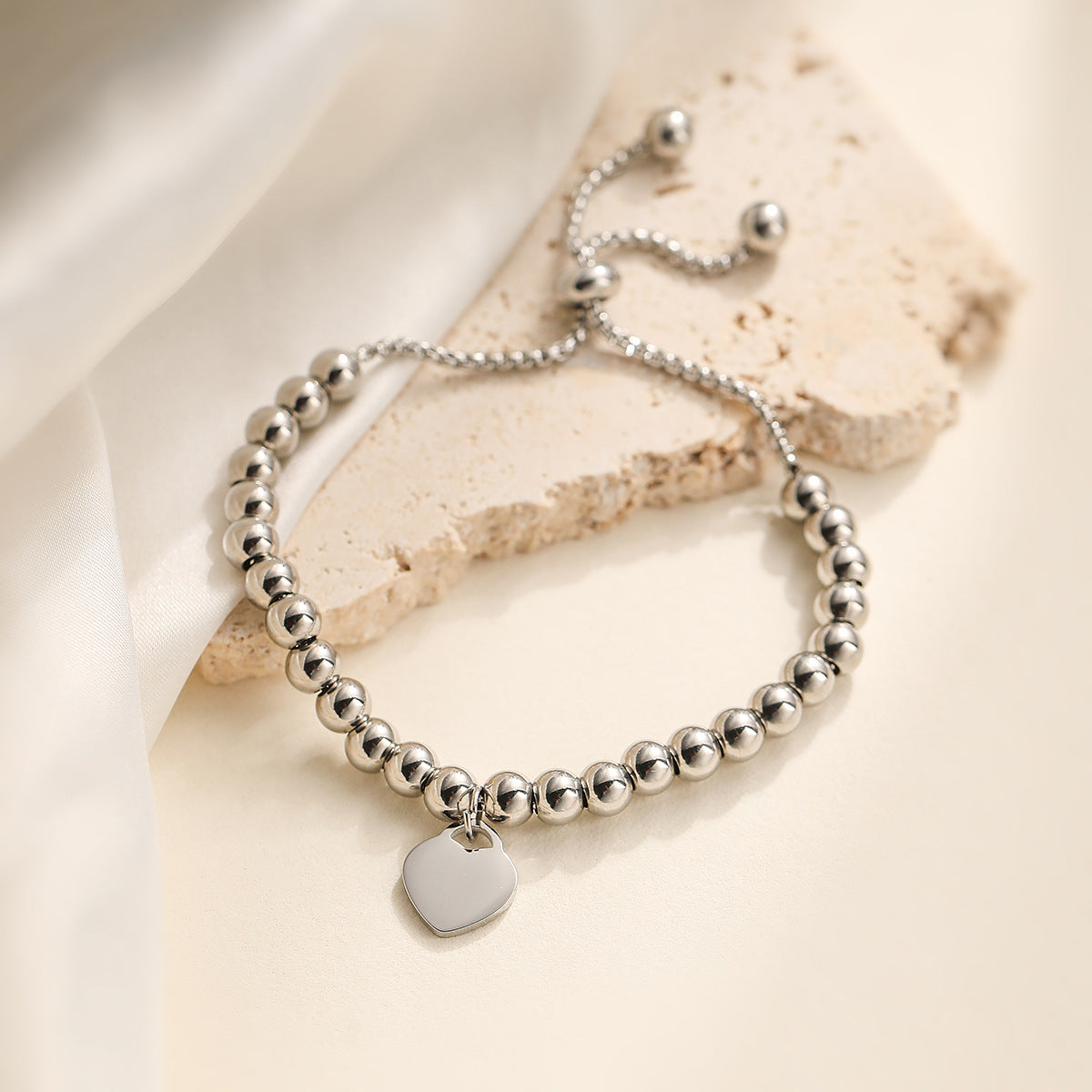 Minimalist Luxe Heart Pendant Adjustable Stainless Steel Beaded Bracelet for Women with Plated Finish