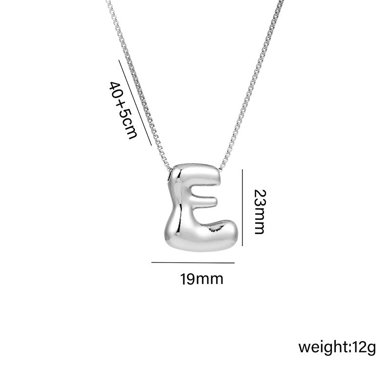 Collar con colgante de acero titanio con forma de letra minimalista y chapado en oro para mujer
