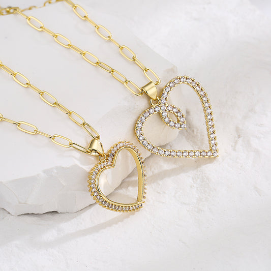 Collana con pendente a cuore cavo minimalista in rame con placcatura in oro vero e intarsio di zirconi per donna