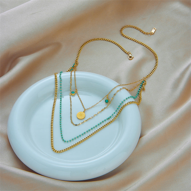 Collana con ciondolo rotondo a stella a otto punte irregolare geometrica in acciaio al titanio placcato
