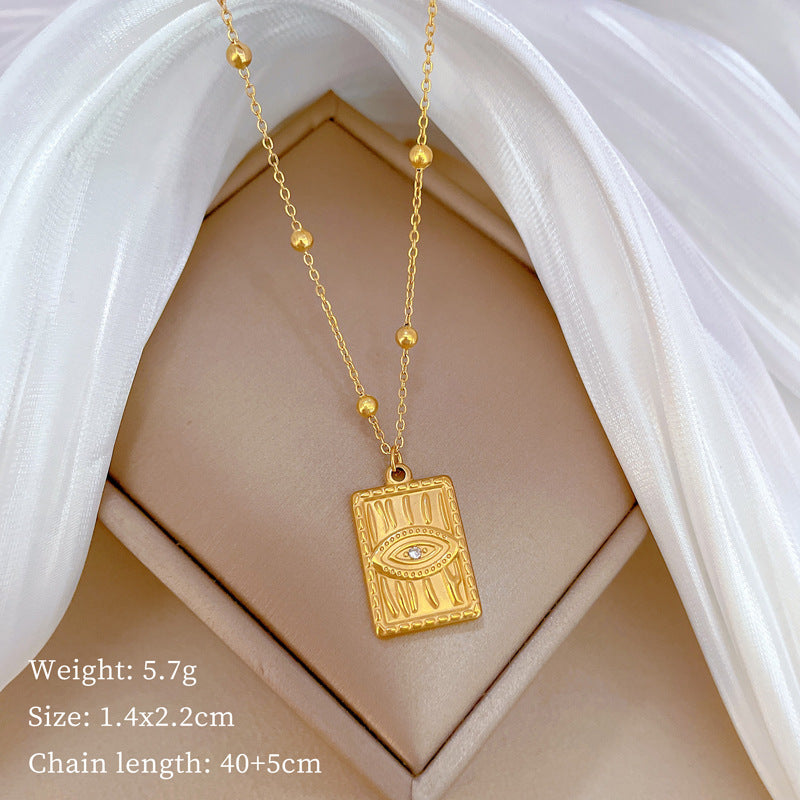 Minimalist Geometric Titanium Steel Pendant Necklace for Women and Men with Gold Plated Finish and Angular Bead Detail